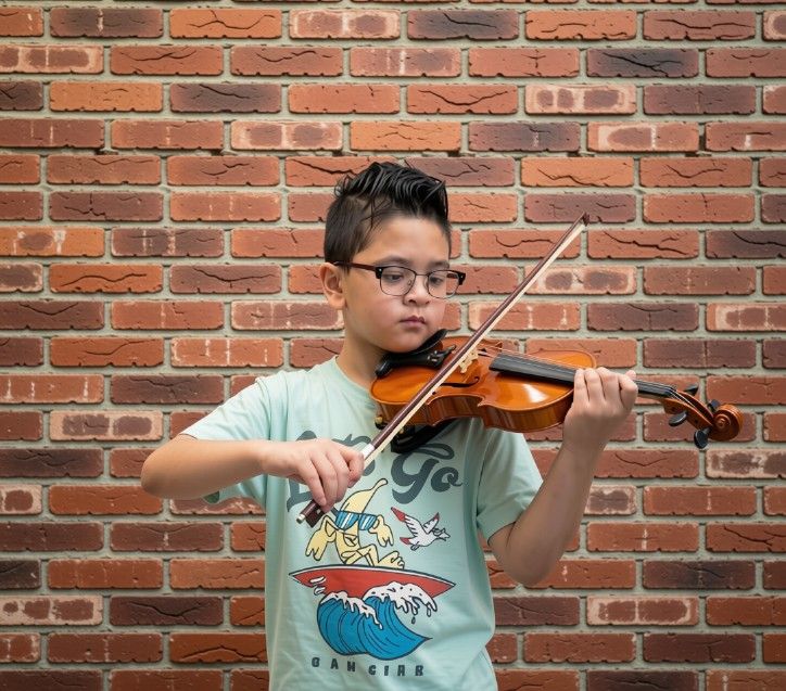 Young violin student