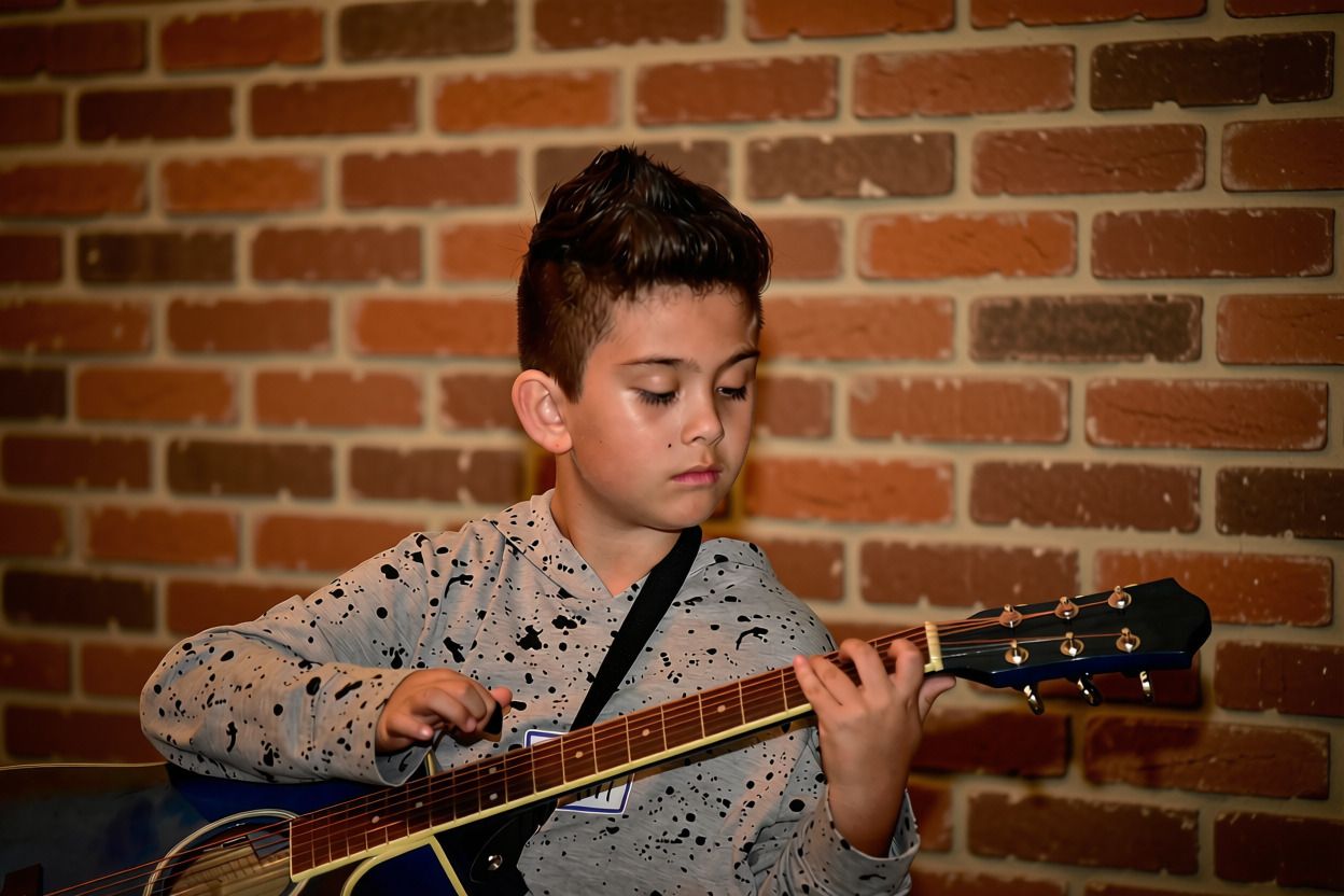 Young guitar student